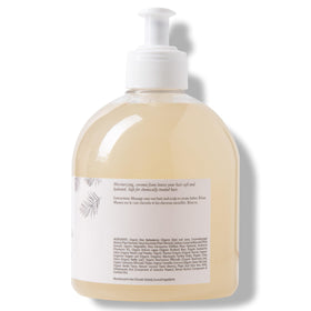 100% PURE bottle staged in bathroom for a calming self-care routine