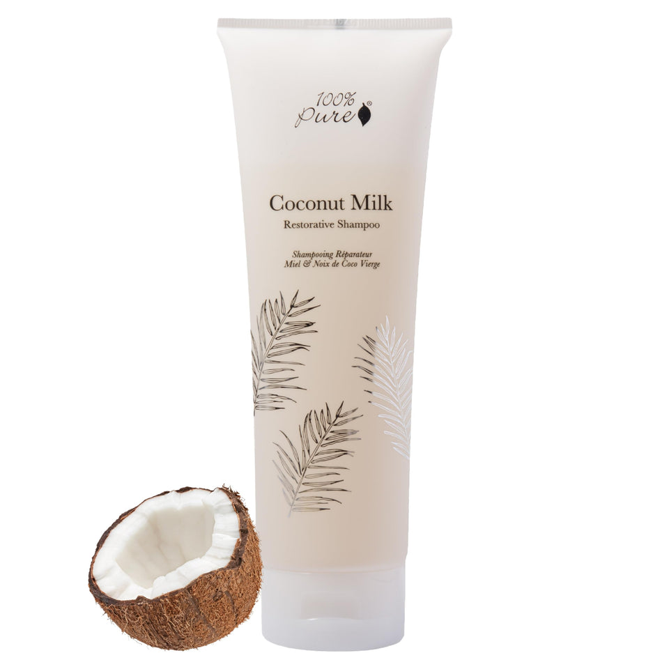 100% PURE front bottle showing coconut milk shampoo for hydrating hair