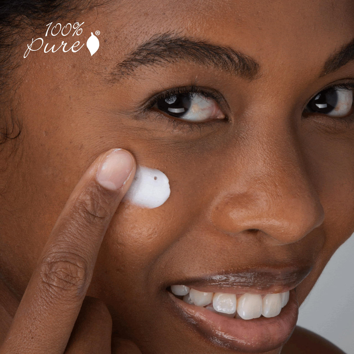 100% PURE open jar revealing smooth cream and easy-to-dispense benefit
