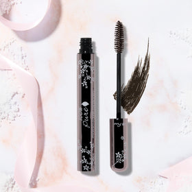 100% PURE tube beside ruler for size and portable .35 oz convenience