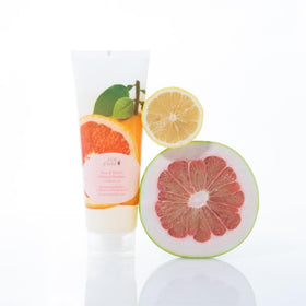 100% PURE ingredients flatlay including yuzu, pomelo, kelp, nettle