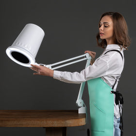 4BLANC wired speed controller in hand offering simple suction adjustments