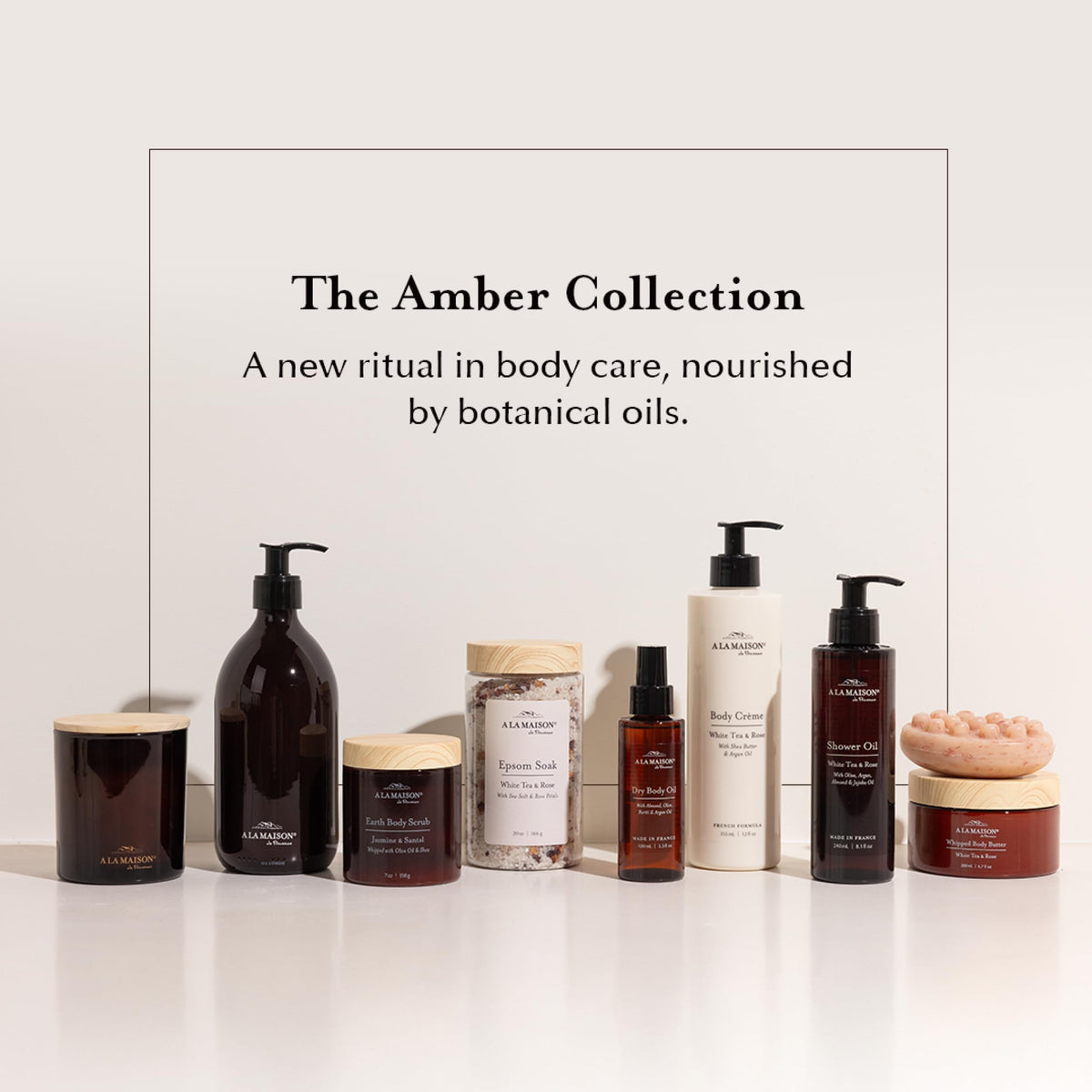 A LA MAISON bottle in hand illustrating compact 3.3 oz size for travel convenience