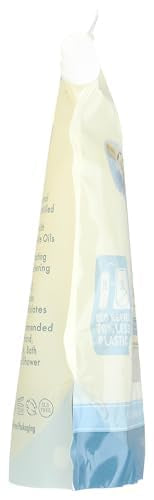 A LA MAISON pouring refill into dispenser to show easy eco-friendly refill benefit