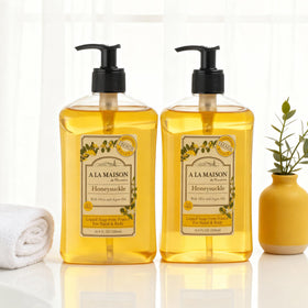A LA MAISON creamy lather texture on palm showing gentle moisturizing foam benefit