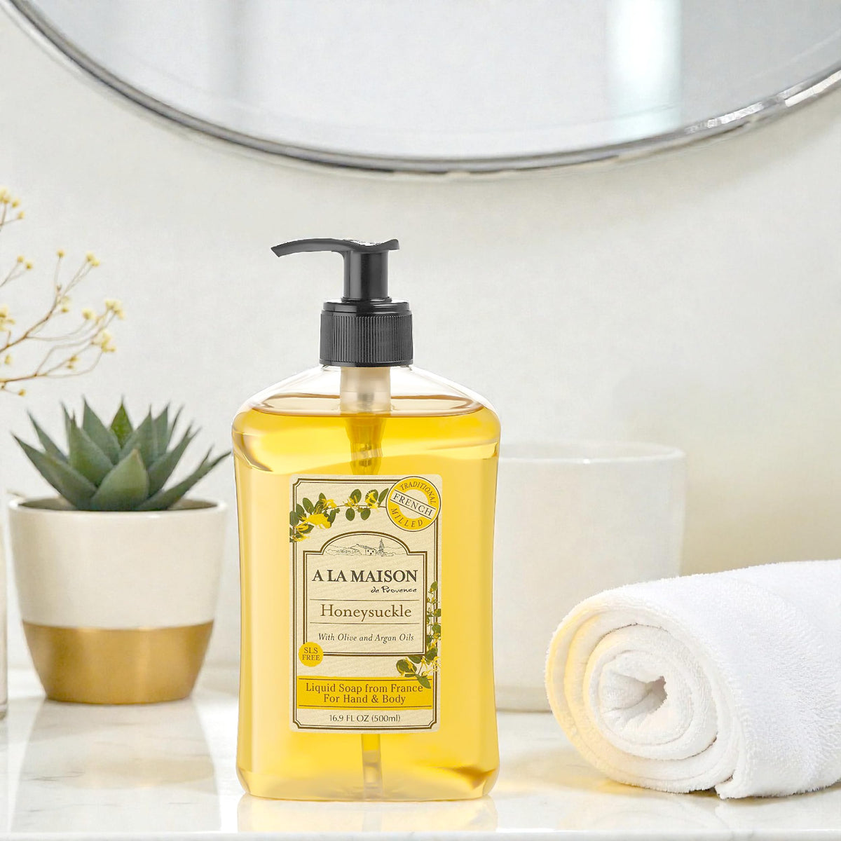 A LA MAISON creamy lather texture on hand showing gentle moisturizing action