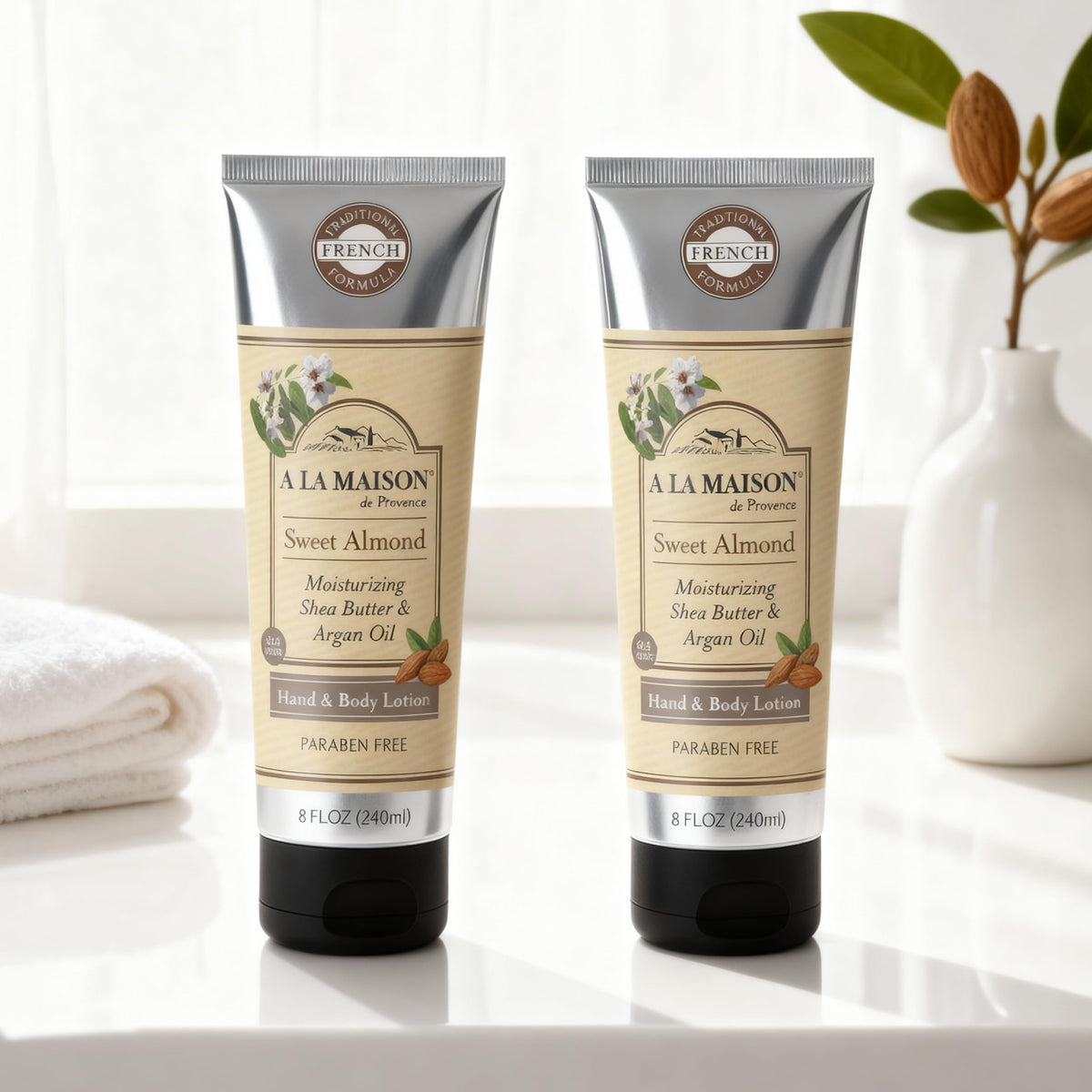 A LA MAISON lotion texture closeup demonstrating creamy non-greasy absorption benefit