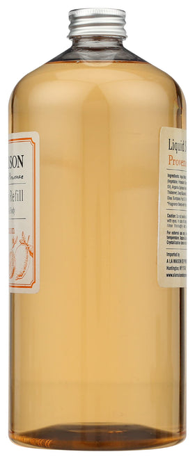 A LA MAISON pouring soap into dispenser to show easy refill and spill-free use
