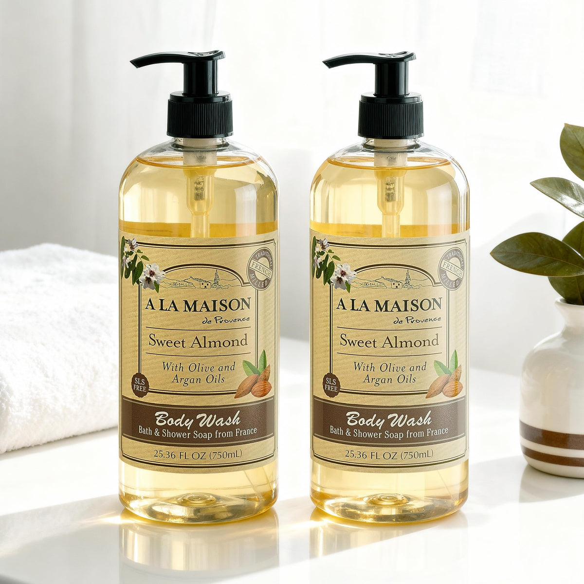 A LA MAISON pump dispensing wash into hand for gentle cleansing