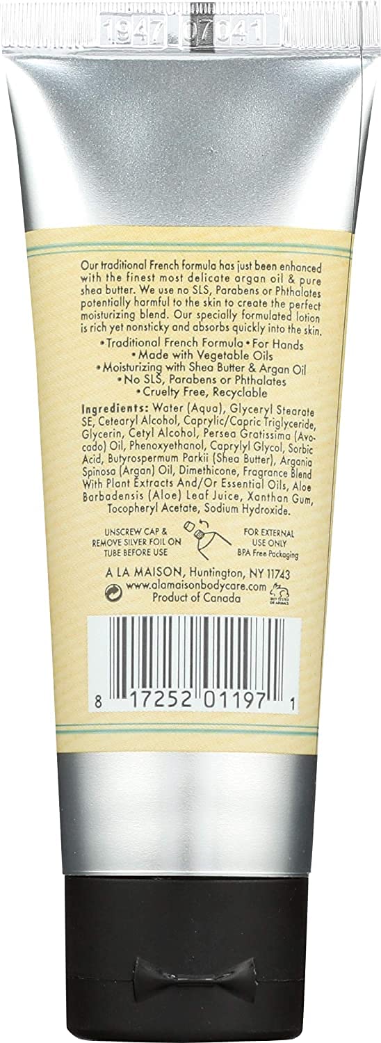 A LA MAISON tubes next to a ruler showing compact 1.7 oz size for travel convenience