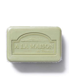 A LA MAISON creamy lather demonstration showing rich moisturizing foam