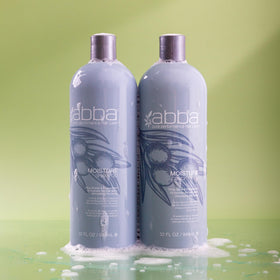 ABBA 32 oz bottle in hand to show size and salon supply value