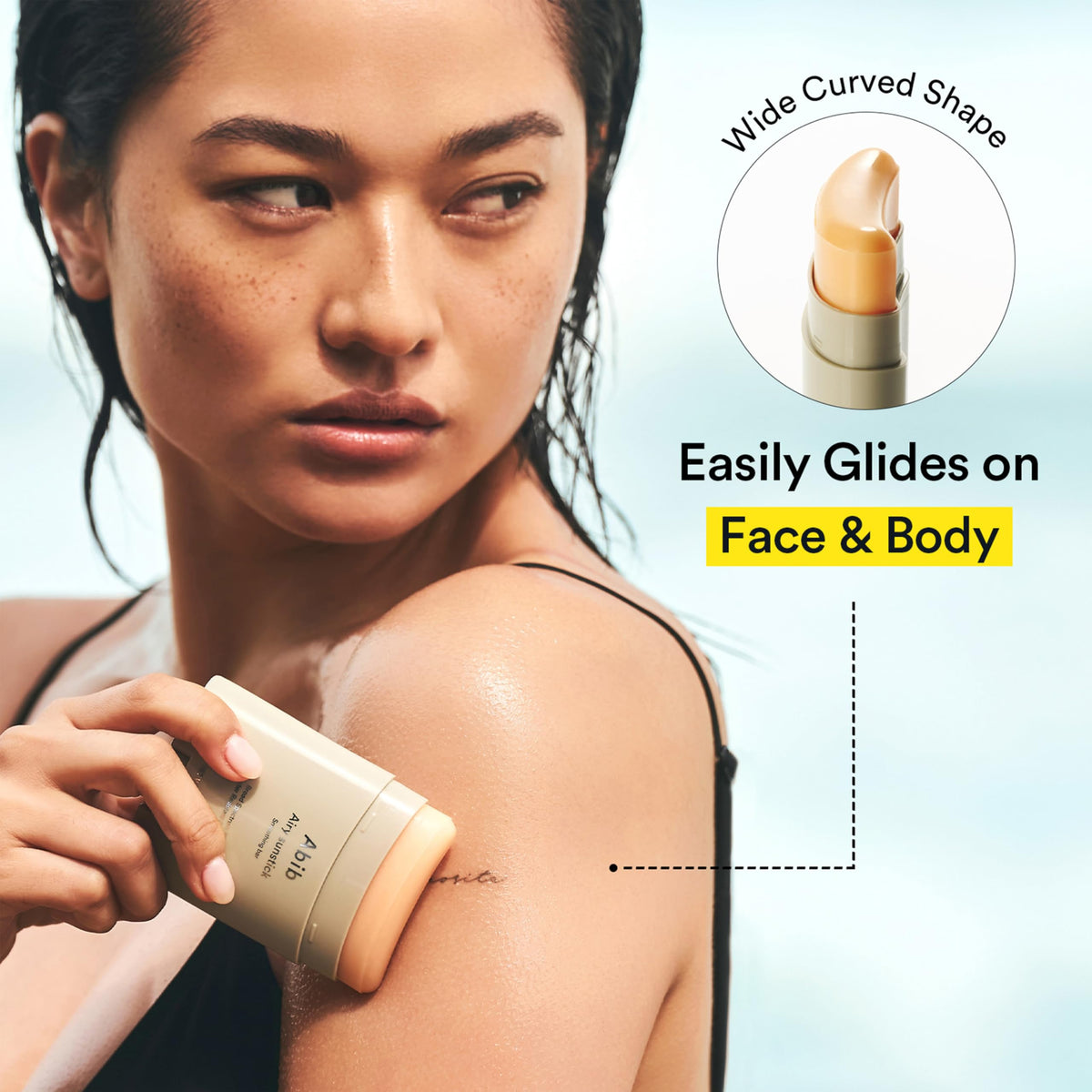 Abib sunstick in hand illustrating compact size for travel convenience