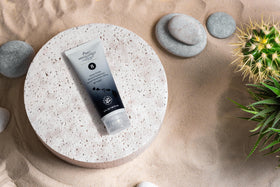 Absolutely Natural being spread on arm demonstrating even coverage for body and face