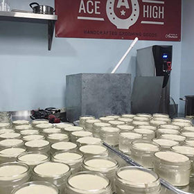 ace high jar next to ruler showing 4oz scale, clarifies portable size for travel