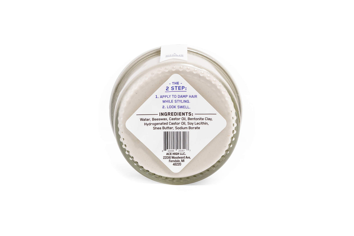 ace high applying clay to hair demonstrating strong hold and texture
