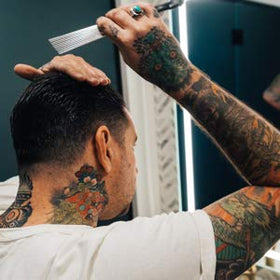 ace high pomade on bathroom shelf in lifestyle scene suggesting daily use