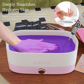 Achzzy hand dipping into warm paraffin for softened skin