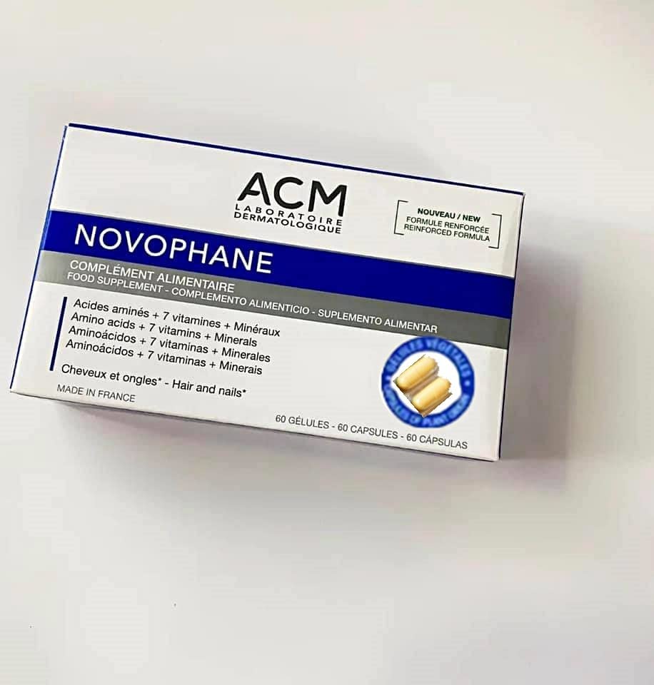 ACM Novophane beside a morning routine: glass, vitamins, and notebook