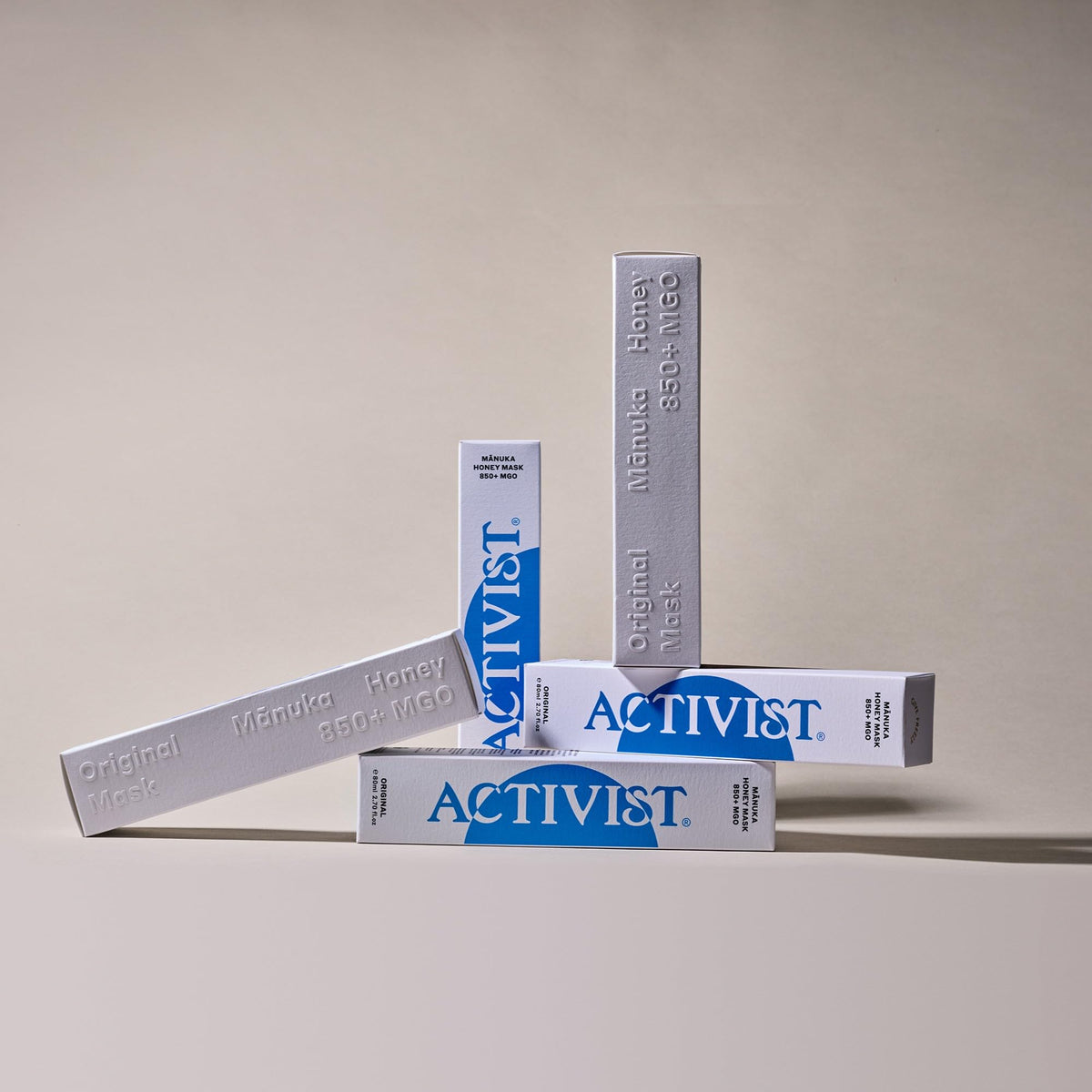 ACTIVIST open jar with spoon illustrating easy scooping and precise application