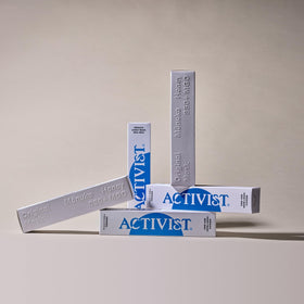 ACTIVIST open jar with spoon illustrating easy scooping and precise application