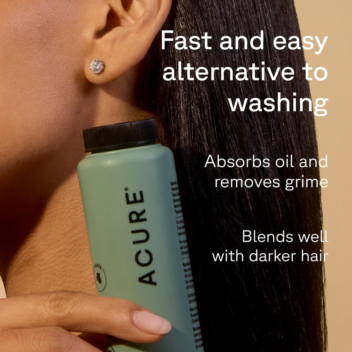 Acure applying powder to dark roots for discreet shine control
