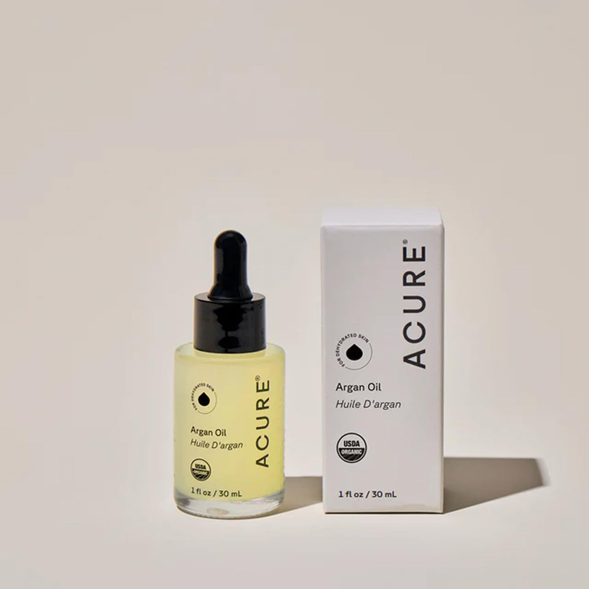 Acure argan oil massaged into facial skin to hydrate and improve texture