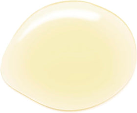 Acure argan oil applied to hair ends adding shine and smoothing frizz