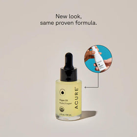 Acure argan oil pouring drop closeup demonstrating silky texture and control