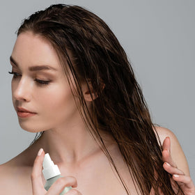 Acure before and after on ends showing softer, less brittle hair benefit