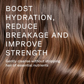 Acure Bonding Shampoo lather texture demonstrating gentle foam and cleansing