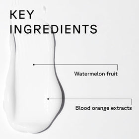 Acure bottles in hand showing 8 fl oz scale for travel-friendly sizing