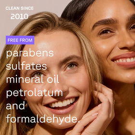 Acure ingredient label closeup showing ferulic acid and vitamin C benefits