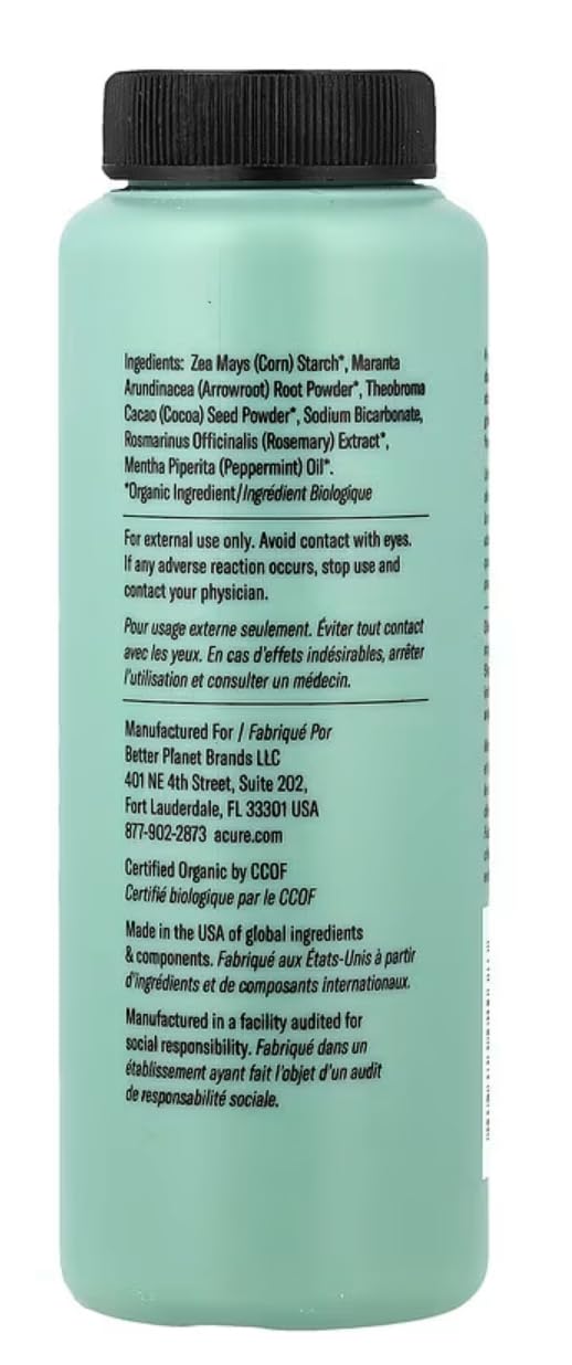 Acure ingredients display with rosemary and cocoa showing natural nourishment benefit