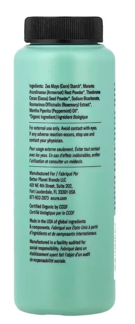 Acure ingredients display with rosemary and cocoa showing natural nourishment benefit