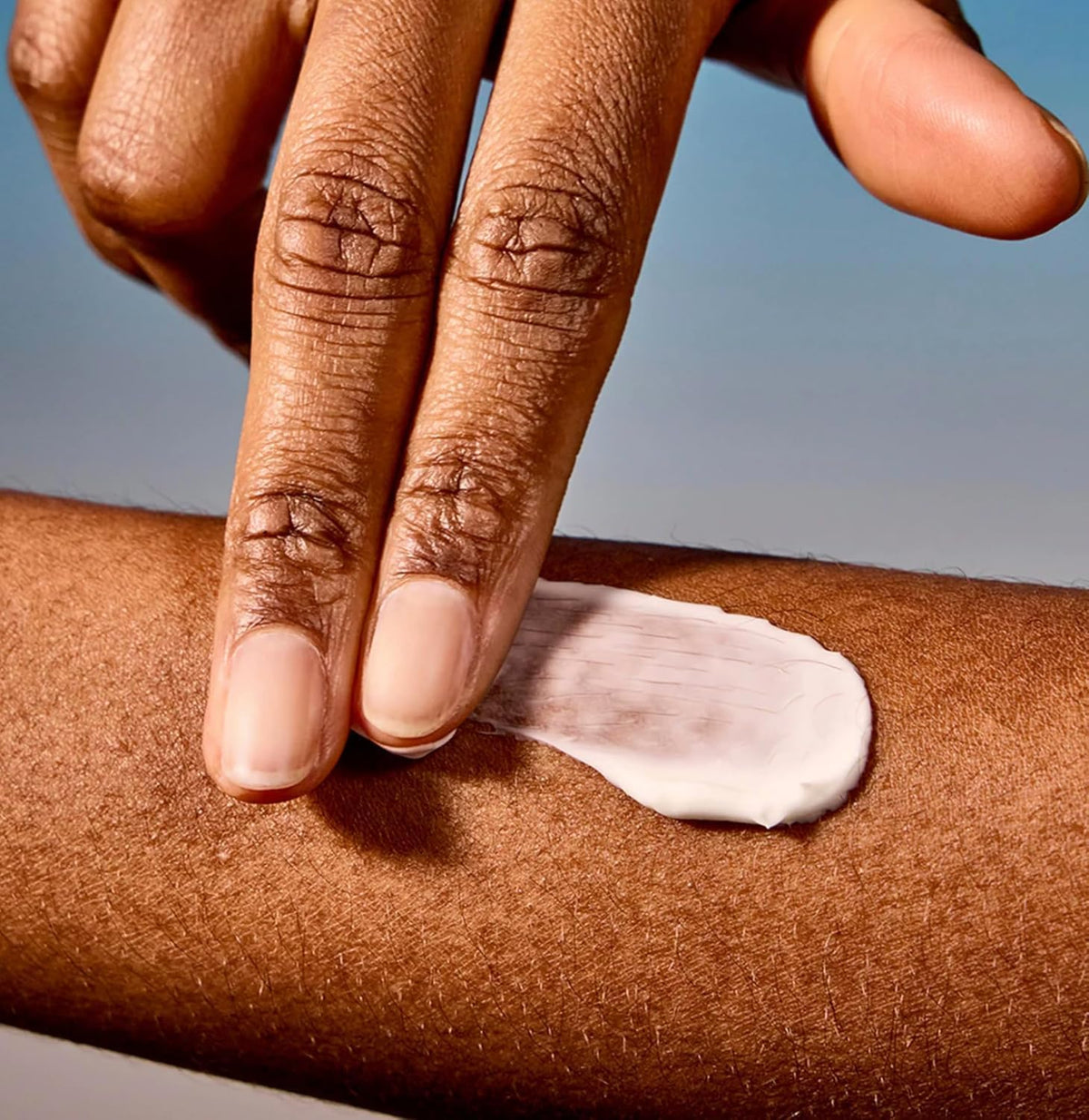 Acure night cream being applied to skin for refreshed morning benefit