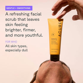 Acure product on hand demonstrating creamy scrub consistency and spreadability
