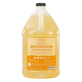 Adams Handmade Soap gallon front view showing label and citrus packaging benefit refill sizing