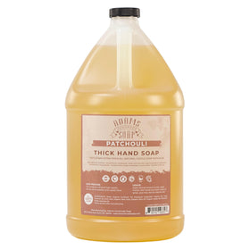 Adams Handmade Soap gallon bottle front label showing patchouli and organic benefits