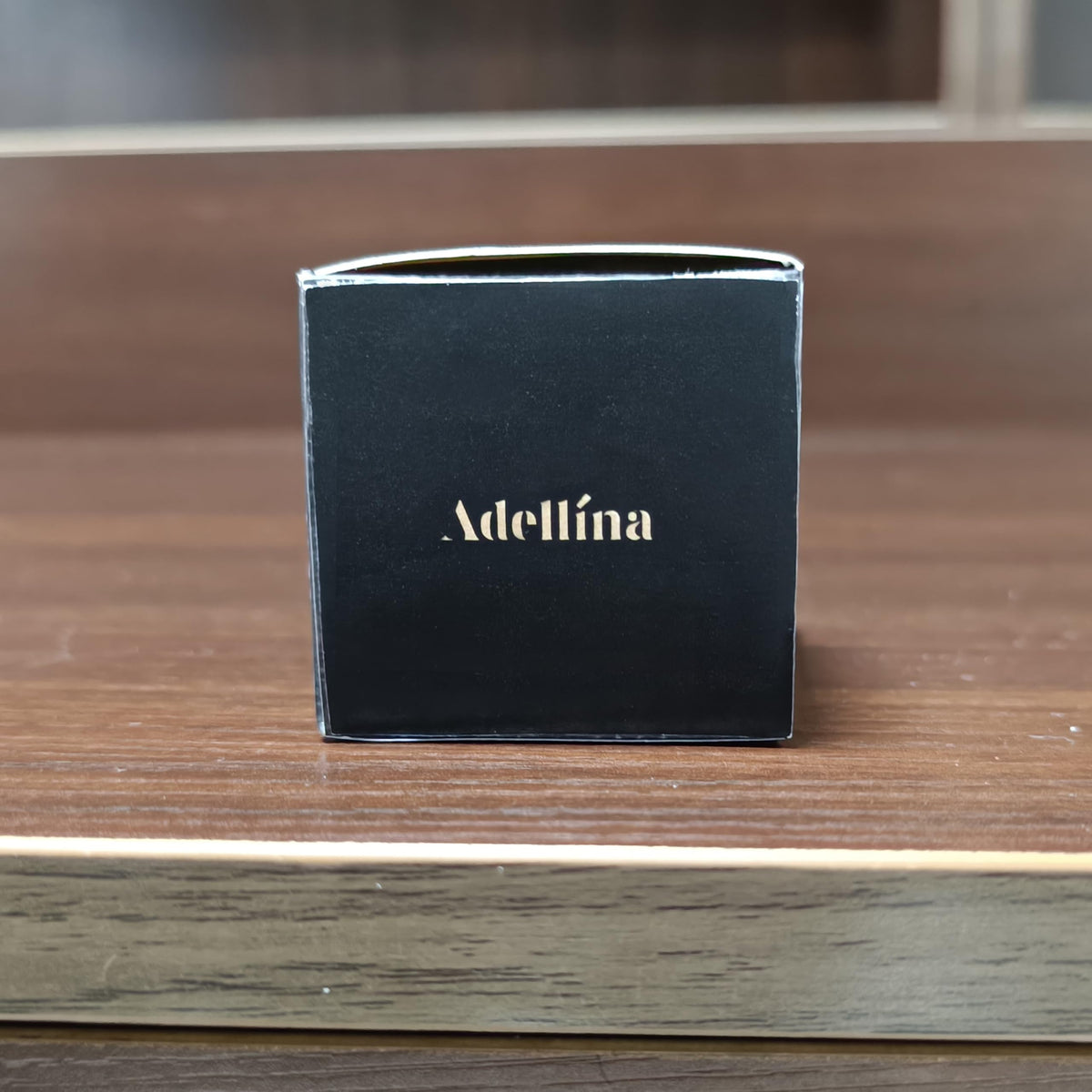 Adellina application demonstration on forearm for temporary comfort