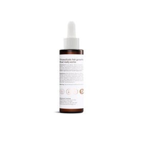 Advanced Trichology HairStem on bathroom counter in lifestyle setting suggesting daily use