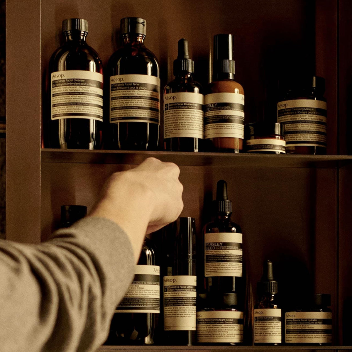 Aesop label closeup revealing ingredient list and recycled bottle messaging