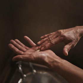 Aesop application on forearm showing fast absorption and immediate softening benefit