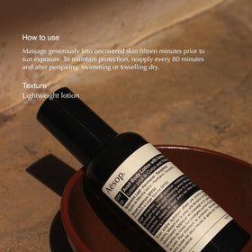 Aesop label closeup highlighting SPF50 and ingredient listing for clarity