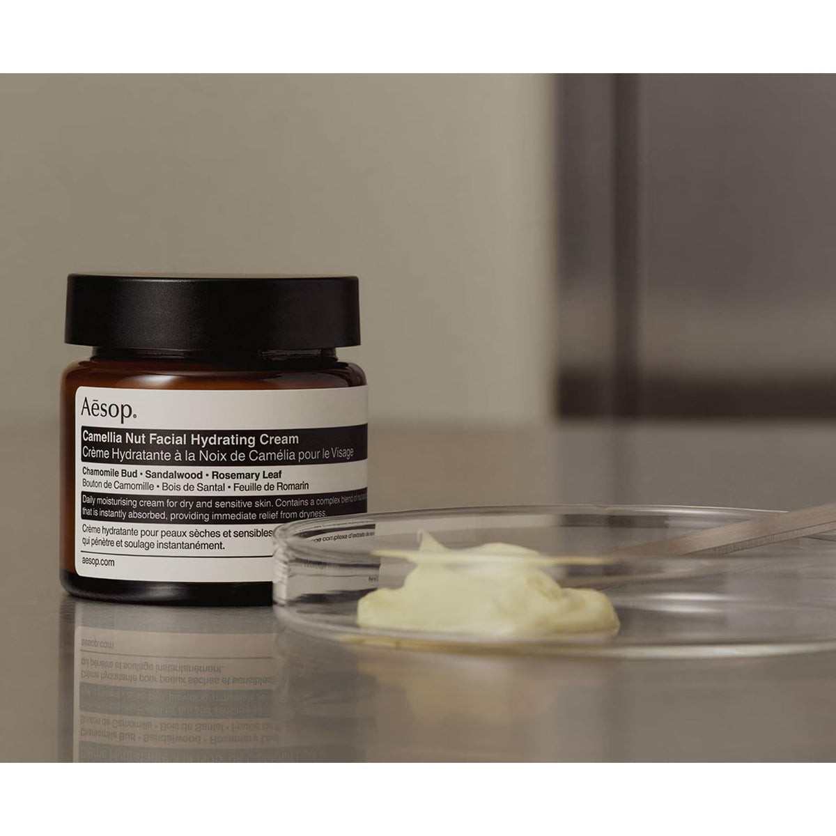 Aesop jar on bathroom shelf in lifestyle setting for daily routine