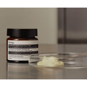 Aesop jar on bathroom shelf in lifestyle setting for daily routine