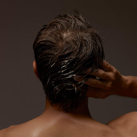 Aesop conditioner placed in bathroom scene suggesting daily routine benefit