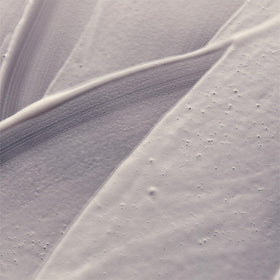 Aesop Eleos cream texture close-up demonstrating silky, hydrating consistency