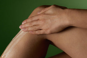 Aesop balm being massaged into hands demonstrating smooth application