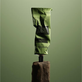 Aesop ingredients label close-up, displays botanical extracts and transparency